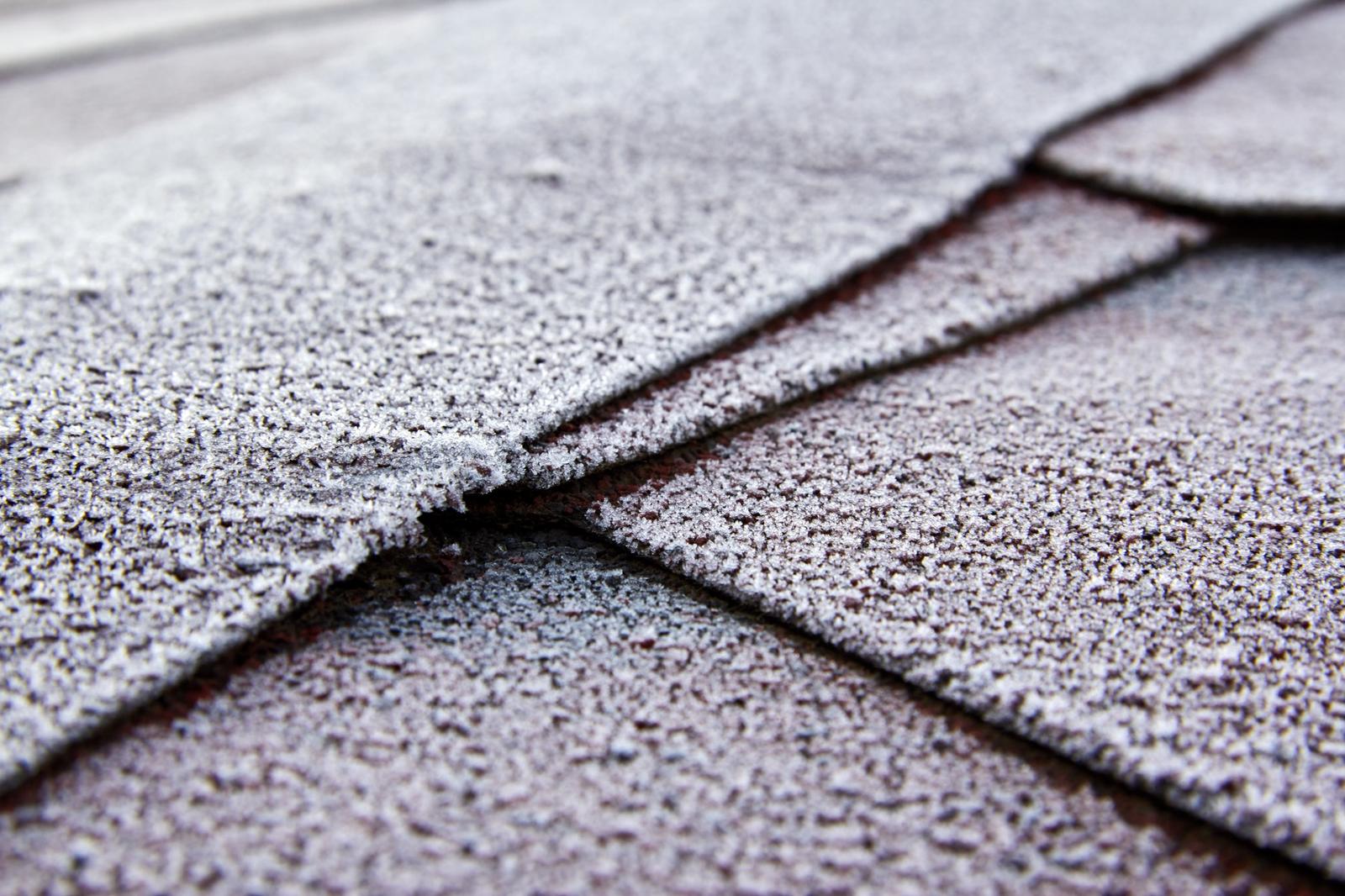 Residential roof and exterior showing new shingles and roofline details
